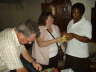 Lynn handing over some Ksh